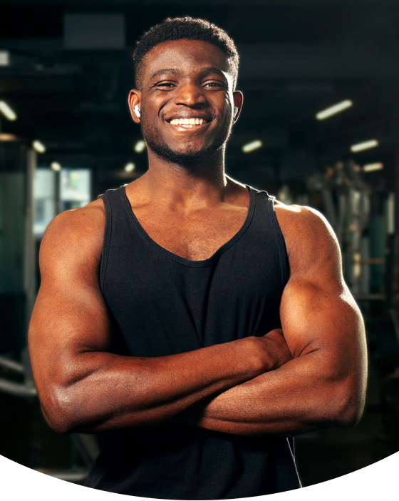 Pre Work cateogry card image of a muscular man in a gym.